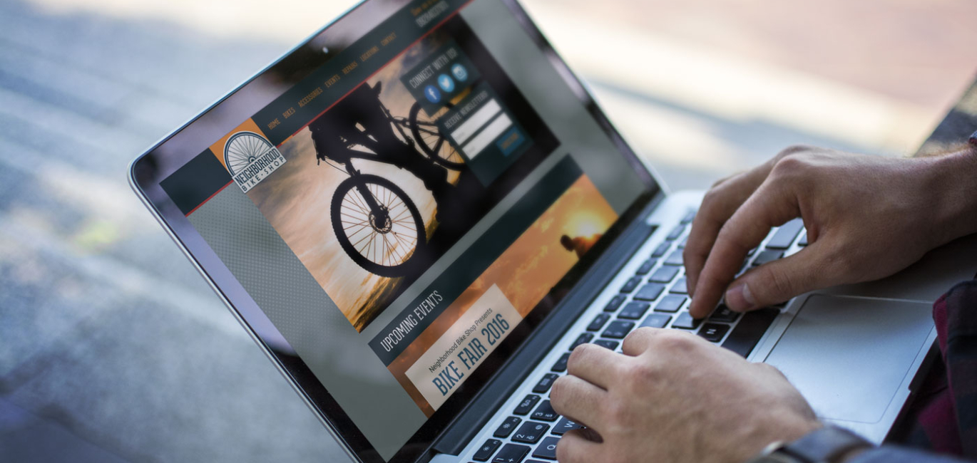 A random man looking up bikes in Neighborhood Bikeshop online