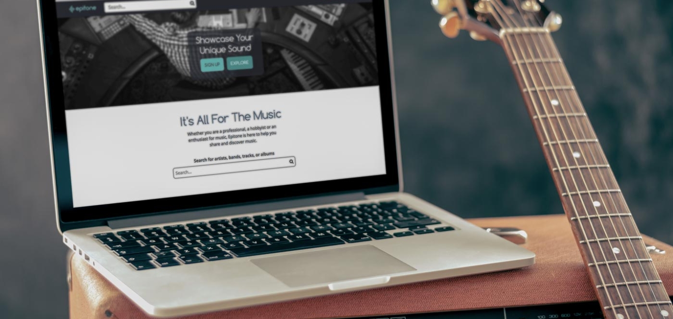 A laptop on a guitar amp with Epitone's home page pulled up