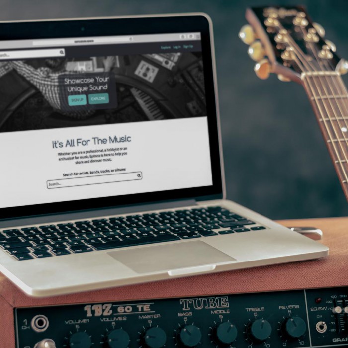 A laptop on a guitar amp with Epitone's home page pulled up